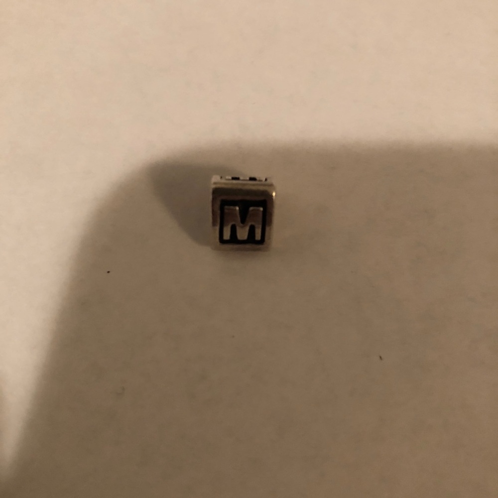 M initial pandora charm